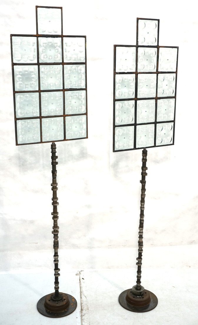 Pr Bejar Magiscope Floor Sculptures. Industrial.: Pr Bejar Magiscope Floor Sculptures. Industrial. 13 glass Magiscope panels. Each panel has a drilled hole. Cam shaft bases. Engraved marks & '97. -- Dimensions: H: 77.5 inches: W: 19.5 inches: D: 10 i