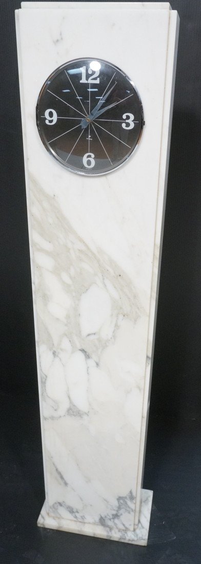 White Marble Tall Case Clock. Clock reads West Ge: White Marble Tall Case Clock. Clock reads West Germany RAYMOR. Chrome bezel.-- Dimensions: H: 52 inches: W: 13 inches: D: 7 inches ---