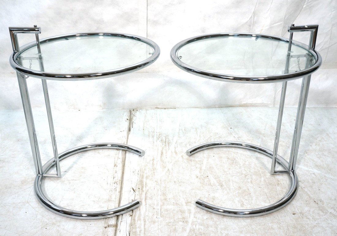 Pr EILEEN GRAY style Side Tables. Chrome with Gla: Pr EILEEN GRAY style Side Tables. Chrome with Glass Tops. Adjustable height. Not marked.-- Dimensions: H: 24.5 inches: W: 20 inches ---