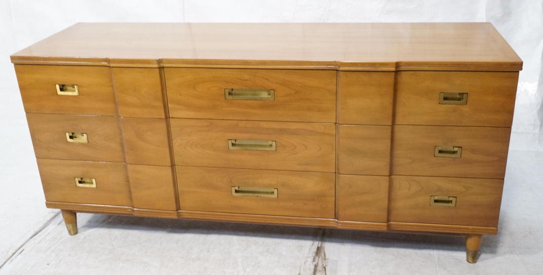WIDDICOMB Modernist Low Dresser Credenza. Nine Dr: WIDDICOMB Modernist Low Dresser Credenza. Nine Drawers with recessed brass pulls. Shaped fronts. Brass foot caps. Marked-- Dimensions: H: 32.25 inches: W: 70.5 inches: D: 21.5 inches ---