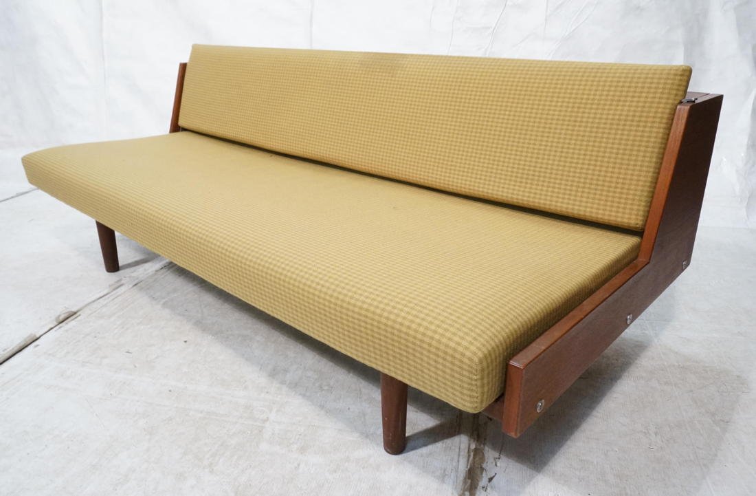 HANS WEGNER Day Bed. Danish Teak. Gold gingham pl: HANS WEGNER Day Bed. Danish Teak. Gold gingham plaid upholstery. Sofa Couch becomes flip out bed. Thick wood column legs-- Dimensions: H: 29.5 inches: W: 78 inches: D: 36 inches ---