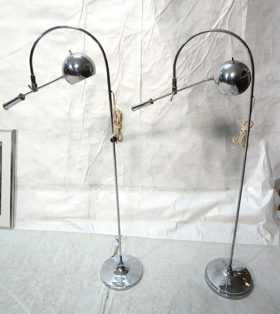 Two Chromed Steel Arched Neck Floor Lamps. ROBERT: Two Chromed Steel Arched Neck Floor Lamps. ROBERT SONNEMAN style. Cantilever Arm with Ball Shade.-- Dimensions: H: 56 inches: W: 31 inches: D: 11.5 inches ---
