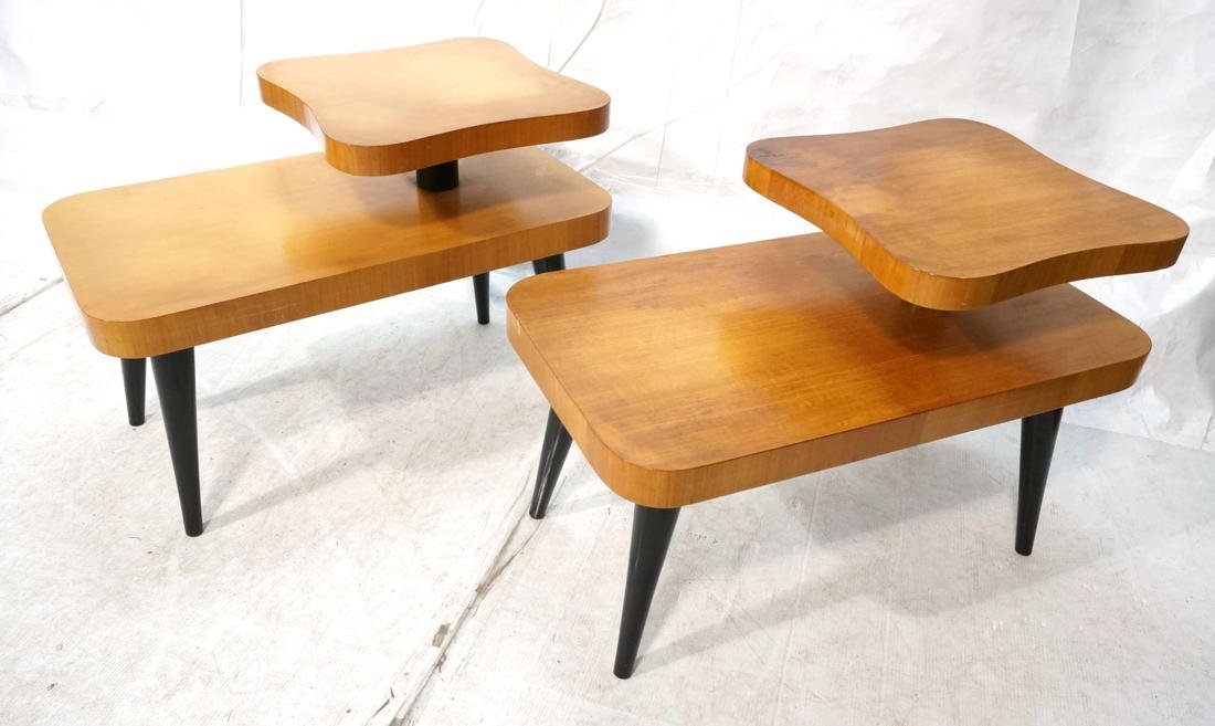 Pr Gilbert Rohde Step Tables. Thick Blond Wood Ti: Pr Gilbert Rohde Step Tables. Thick Blond Wood Tiers on Tapered Ebonized Peg Legs. -- Dimensions: H: 22.75 inches: W: 18 inches: D: 32 inches ---