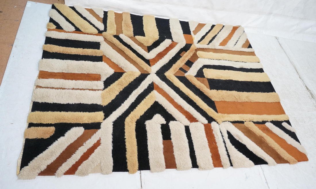 EDWARD FIELDS Large Shag Carpet. Sculpted High &: EDWARD FIELDS Large Shag Carpet. Sculpted High & Low Shag. Browns, Tans & Beiges. Marked; 1972. -- Dimensions: H: 7' inches: W: 9' inches ---