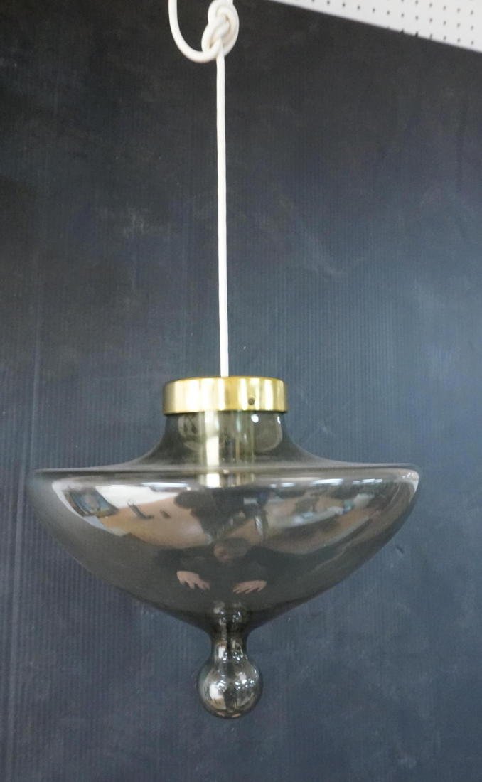 Raak Smokey Glass Pendant Lamp. Brass mount. Ph: Raak Smokey Glass Pendant Lamp. Brass mount. Philadelphia furniture show.-- Dimensions: H: 10 inches: W: 12 inches ---
