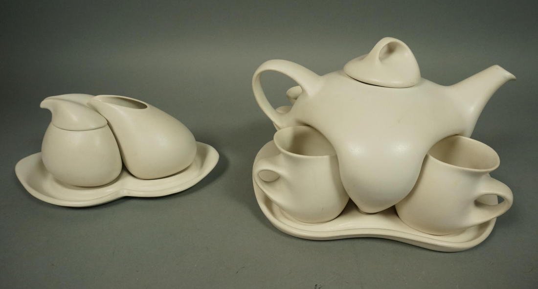Peter Saenger Tea Set. Nesting teapot and cups o: Peter Saenger Tea Set. Nesting teapot and cups on tray and nesting creamer and sugar in tray. White.-- Dimensions: H: 7 inches: W: 10 inches: D: 9 inches ---