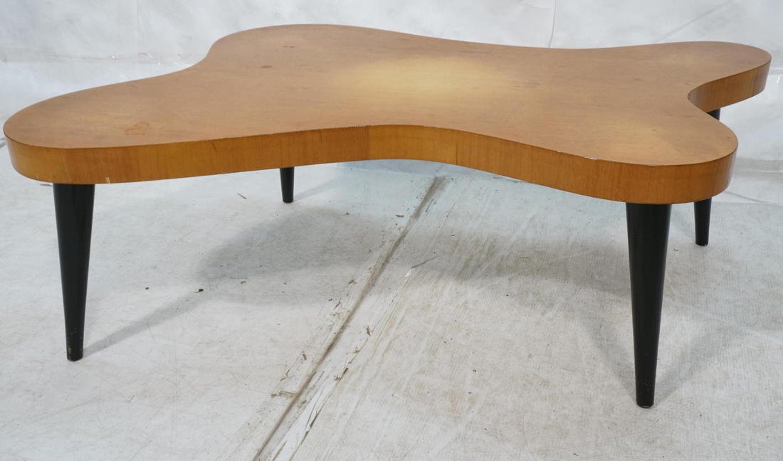 Gilbert Rohde Style Coffee Cocktail Table. Cloud: Gilbert Rohde Style Coffee Cocktail Table. Cloud Form on Tapered Ebonized Legs. -- Dimensions: H: 16 inches: W: 43 inches: D: 32 inches ---