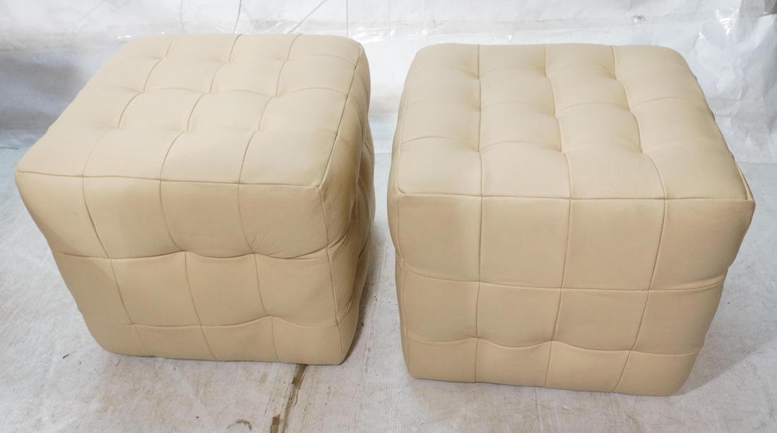 Pair Decorator Leather Footstool Ottomans. Tan L: Pair Decorator Leather Footstool Ottomans. Tan Leather quilted design.-- Dimensions: H: 18.5 inches: W: 21 inches: D: 21 inches ---