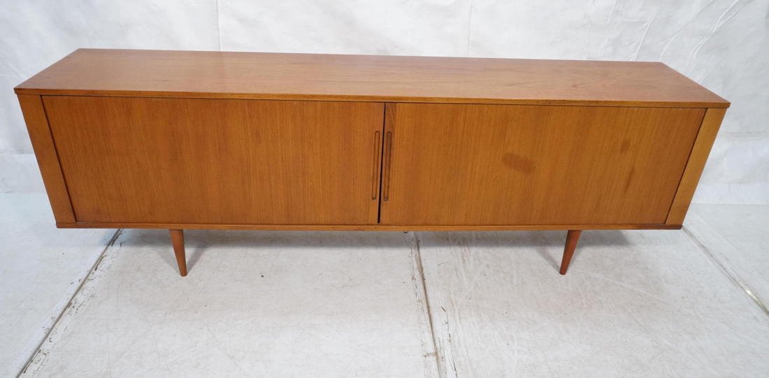 Danish Modern Teak Credenza Sideboard Cabinet. T: Danish Modern Teak Credenza Sideboard Cabinet. Tambour Doors. Doors stick some tight when open all the way. Replaced legs not original. -- Dimensions: H: 29 inches: W: 86.25 inches: D: 16.75 inches --