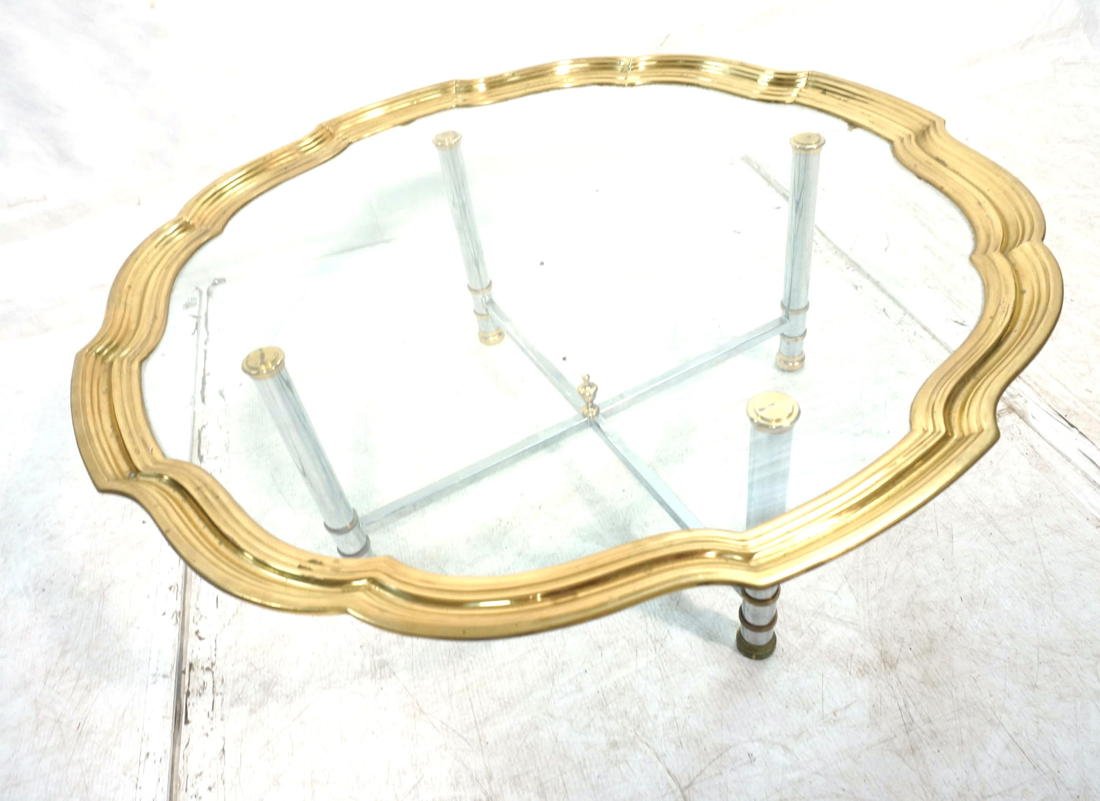 Decorator Coffee Cocktail Table. Chrome & Brass B: Decorator Coffee Cocktail Table. Chrome & Brass Base. Glass top with heavy brass shaped gallery top. -- Dimensions: H: 17 inches: W: 41.5 inches ---