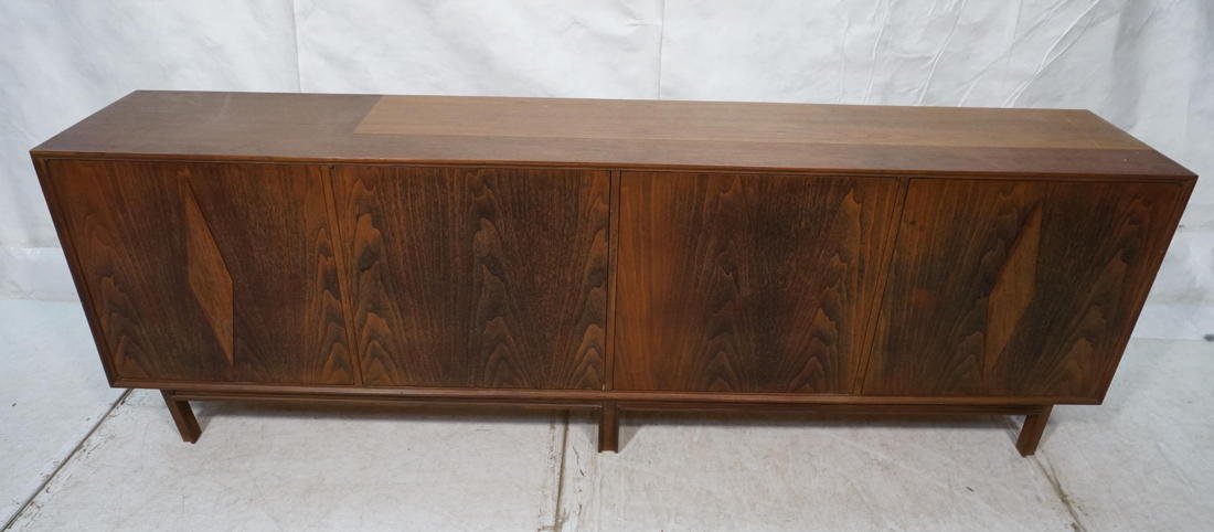 Large Oversized Walnut American Modern Credenza S: Large Oversized Walnut American Modern Credenza Sideboard. Four spring loaded door buffet. Interior has drawers and shelves.-- Dimensions: H: 31 inches: W: 96 inches: D: 18 inches ---