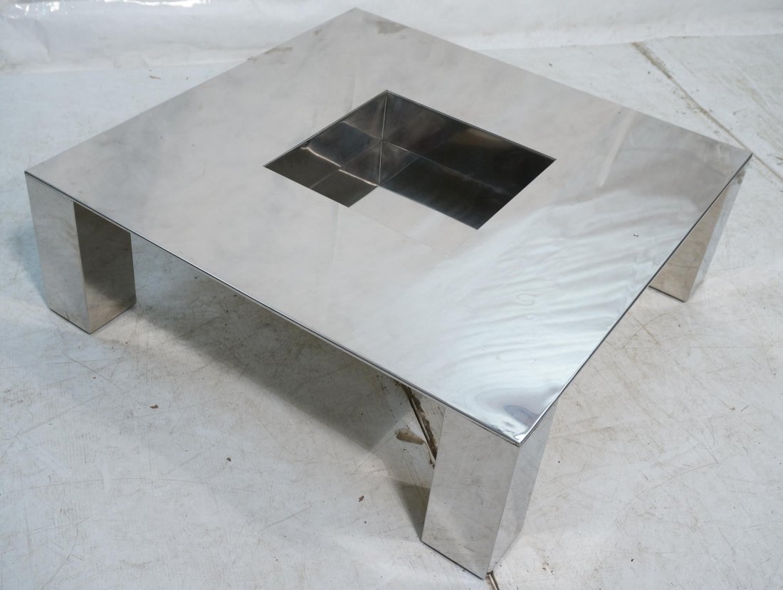 Low Chromed Steel Coffee Table. GIOVANNI OFFREDI: Low Chromed Steel Coffee Table. GIOVANNI OFFREDI for SAPORITI. Center storage catch all. -- Dimensions: H: 13 inches: W: 39 inches: D: 39 inches ---