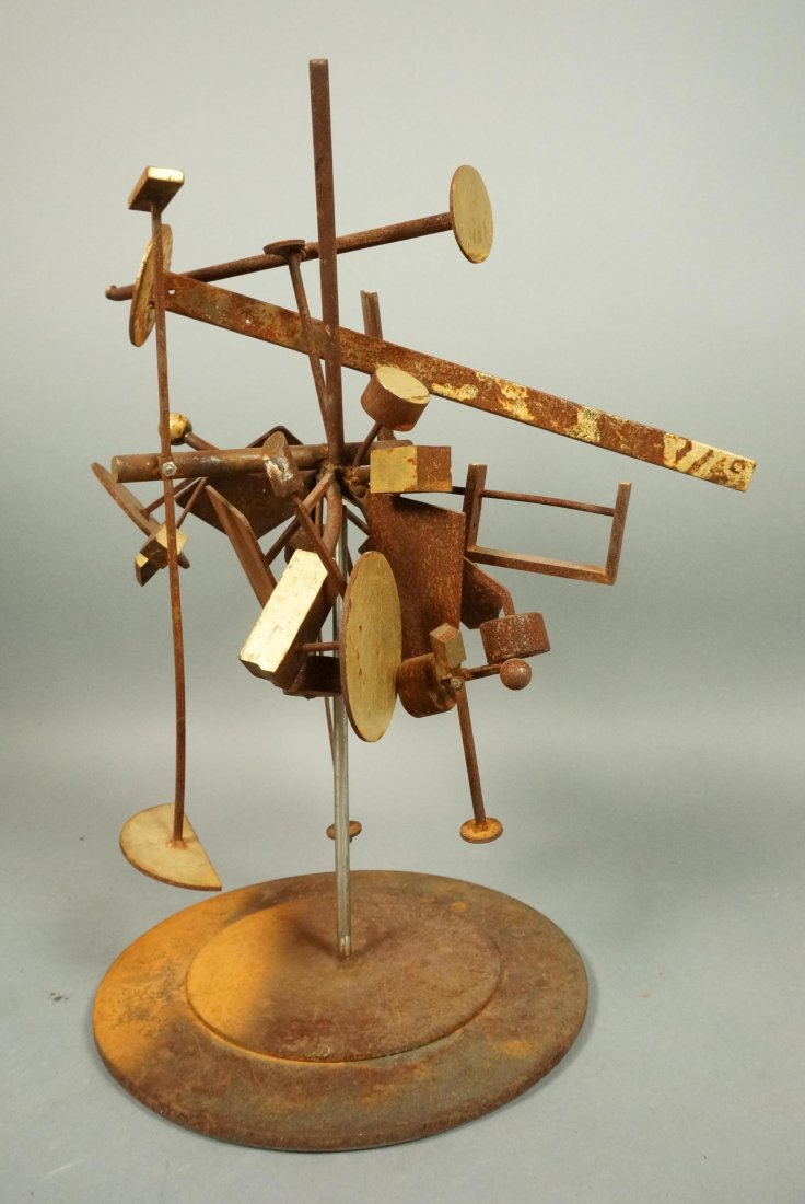 Industrial Welded Iron Kinetic Table Sculpture. R: Industrial Welded Iron Kinetic Table Sculpture. Rusted Geometric elements on rods. Paint and gilt highlights. Whole sculpture can spin. TERRY LEE DILL, sculptor.-- Dimensions: H: 22 inches: W: 19 inch