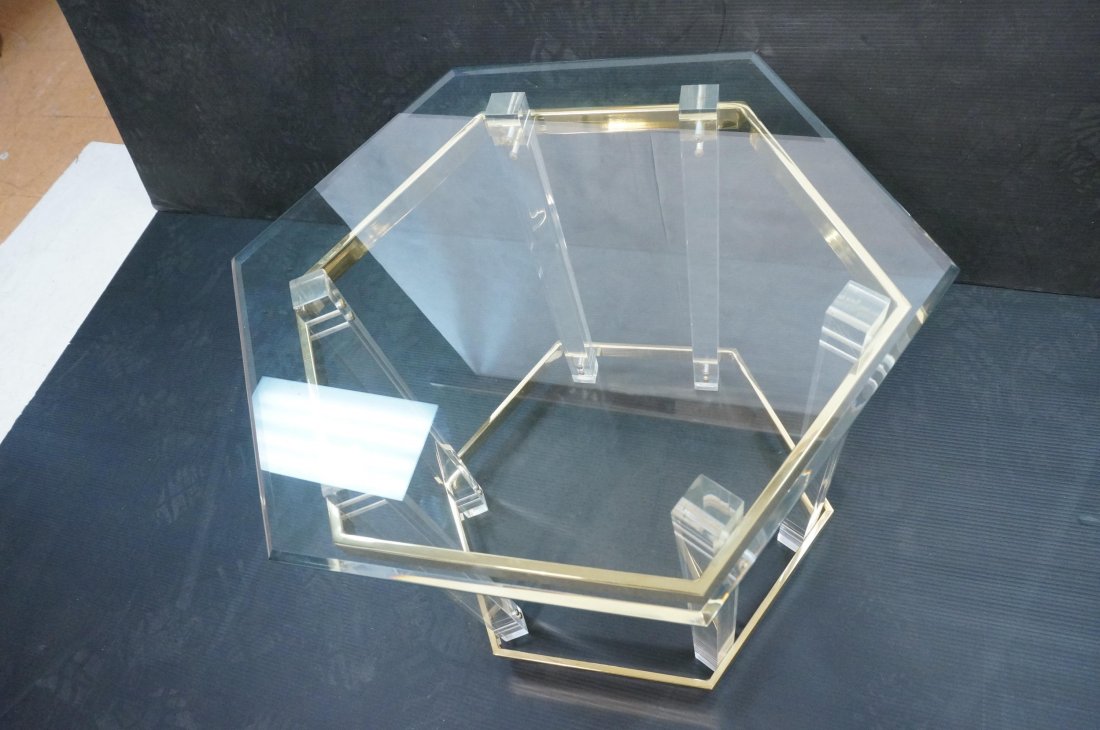 CHARLES HOLLIS JONES Side Table. Thick square luc: CHARLES HOLLIS JONES Side Table. Thick square lucite legs with brass bands. Six sided beveled glass top. -- Dimensions: H: 22.75 inches: W: 26 inches: D: 22 inches ---