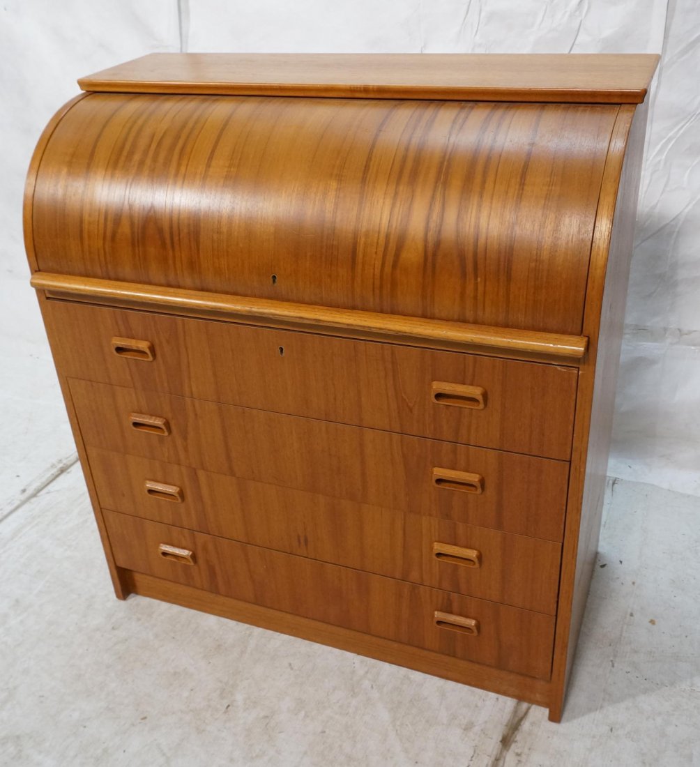 Danish Teak Roll Top Desk. Fitted desk interior w: Danish Teak Roll Top Desk. Fitted desk interior with three drawers. Four drawers with recessed wood pulls. Pull out -- Dimensions: H: 38 inches: W: 35 inches: D: 19 inches ---