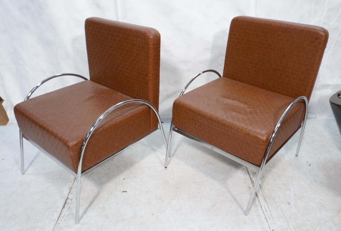 Pr Oversized Brown Leather Lounge Chairs. Chrome: Pr Oversized Brown Leather Lounge Chairs. Chrome tube frames. Woven look brown leather-- Dimensions: H: 38 inches: W: 27 inches: D: 29 inches ---