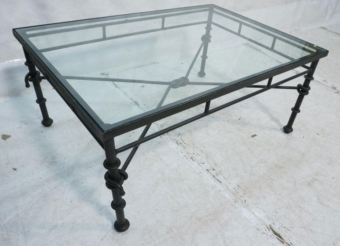 BAKER & KNAPP Wrought Iron Coffee Table. Giacom: BAKER & KNAPP Wrought Iron Coffee Table. Giacometti Series. Glass top on sculpted metal base cocktail table. -- Dimensions: H: 18 inches: W: 40 inches: D: 28 inches ---