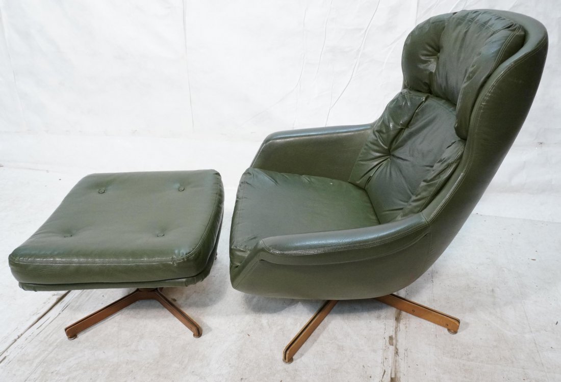 SELIG Green Vinyl TAll Lounge Chair & Ottoman. Tu: SELIG Green Vinyl TAll Lounge Chair & Ottoman. Tufted upholstery. On Split Walnut "X" Bases. Paper label.-- Dimensions: H: 38 inches: W: 32 inches: D: 32 inches ---