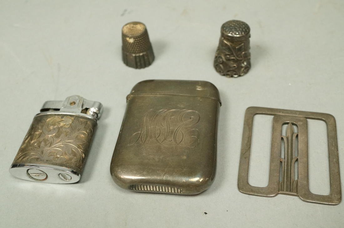 5pc Sterling Lot. 1) GEORG JENSEN Book Clip #289: 5pc Sterling Lot. 1) GEORG JENSEN Book Clip #289 Denmark. 2pc Sterling thimbles; one marked Mexico. 4) Sterling Match Safe Vesta, monogrammed. 5) 950 Sterling Lighter.-- Dimensions: --- Weight: 3.15 T