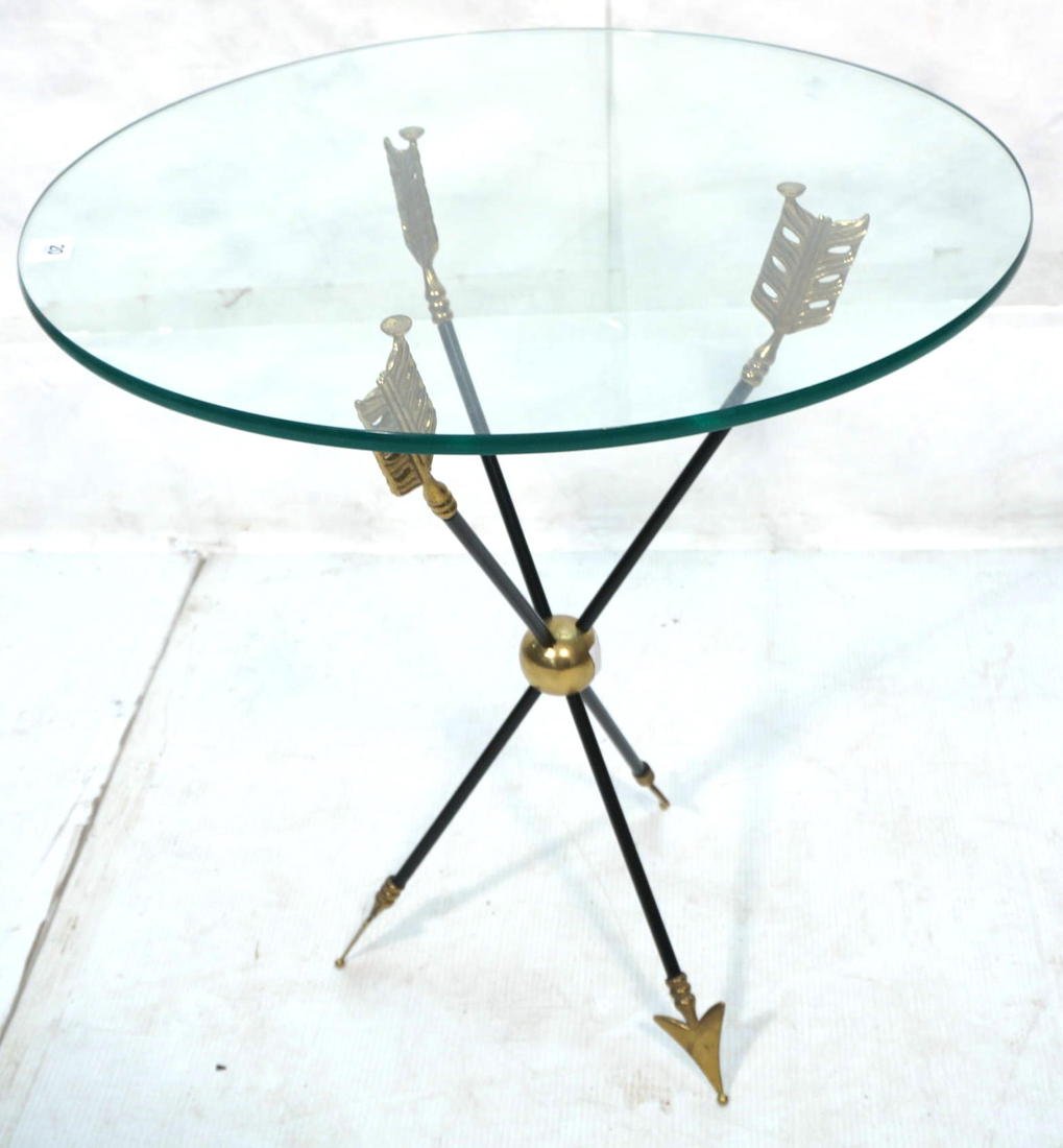 Regency Style Italian Arrow Base Side Table. Bra: Regency Style Italian Arrow Base Side Table. Brass with Black Rods. Glass Top.-- Dimensions: H: 25 inches: W: 24 inches: D: 24 inches ---