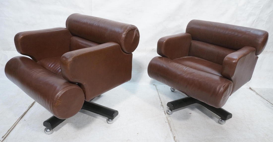 Pr Rolling Brown Leather Office Chairs. JOE COLOM: Pr Rolling Brown Leather Office Chairs. JOE COLOMBO. Round Headrest and foot Bumper on squared form chair. Marked Dictaphone Corp. -- Dimensions: H: 32 inches: W: 28 inches: D: 31 inches ---