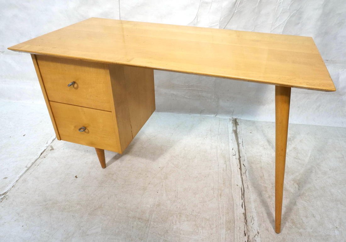 PAUL McCOBB Maple Desk with Signature Ring Handle: PAUL McCOBB Maple Desk with Signature Ring Handles Pulls. Tapered legs. Two drawers. -- Dimensions: H: 29 inches: W: 48 inches: D: 24 inches ---