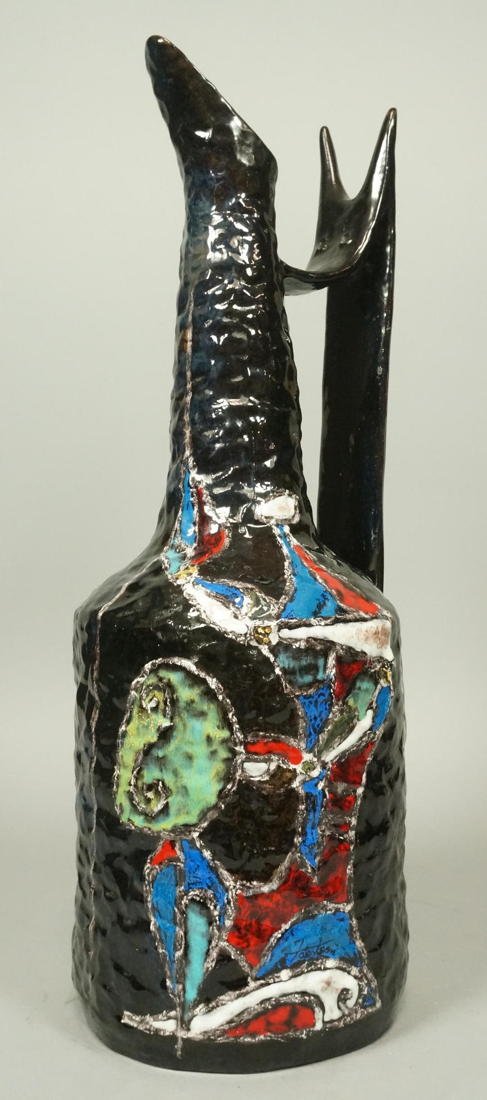 Large FANTONI Italian Pottery Vase Pitcher. Black: Large FANTONI Italian Pottery Vase Pitcher. Black Ground with architectural handle. Figural decoration of man with shield. Rich red contrasting interior-- Dimensions: H: 20 inches: W: 7.5 inches --- U