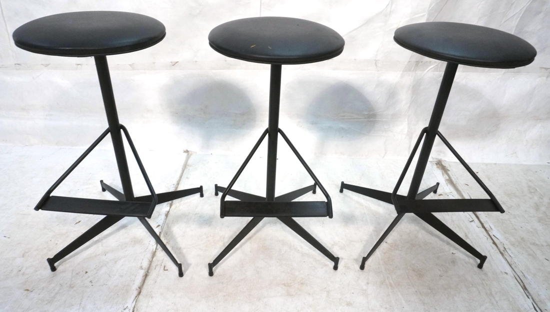 3pc Black Iron Bar Stools. Round black seats. Swi: 3pc Black Iron Bar Stools. Round black seats. Swivel. Not marked. -- Dimensions: H: 29 inches: W: 17 inches: D: 17 inches ---