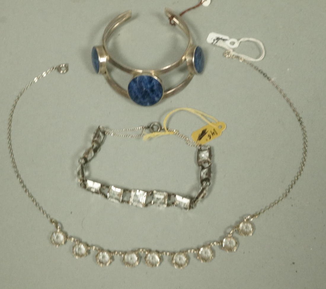 3pc Sterling Jewelry. 1. Mexican Blue Stone (soda: 3pc Sterling Jewelry. 1. Mexican Blue Stone (sodalite) Bracelet. 2. Sterling Bracelet with square faceted crystal links. 3. Sterling chain with faceted crystal pendant drops. Necklace is 15" long.-- D