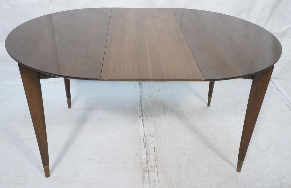 GIO PONTI Oval Dining Table. Shaped legs with met: GIO PONTI Oval Dining Table. Shaped legs with metal foot caps. Three 16" leaf. -- Dimensions: H: 29 inches: W: 40 inches: D: 39.5 inches ---