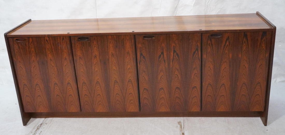 Rosewood Four Door Credenza Sideboard. Danish Mod: Rosewood Four Door Credenza Sideboard. Danish Modern. Recessed wood pulls. Danish control label-- Dimensions: H: 32 inches: W: 78.5 inches: D: 18.25 inches ---