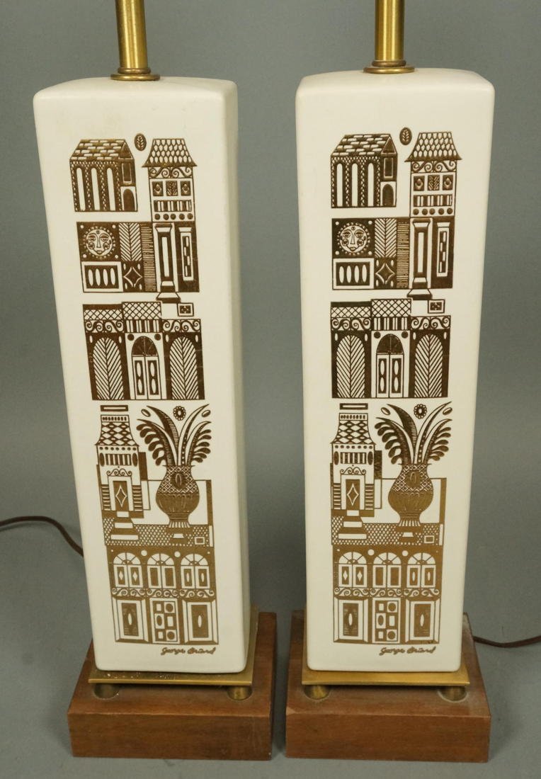 Pr GEORGE BRIARD White Column Ceramic Table Lamps: Pr GEORGE BRIARD White Column Ceramic Table Lamps. Gold paint decoration. Square wood bases. Marked-- Dimensions: H: 24 inches: W: 5.5 inches: D: 4.5 inches ---
