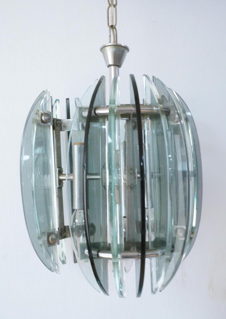 Modernist VECA Deco style Hanging Pendant Light L: Modernist VECA Deco style Hanging Pendant Light Lamp. Three arm chandelier with smoked and clear glass fins. Chrome body. -- Dimensions: H: 16 inches: W: 10 inches: D: 10 inches ---