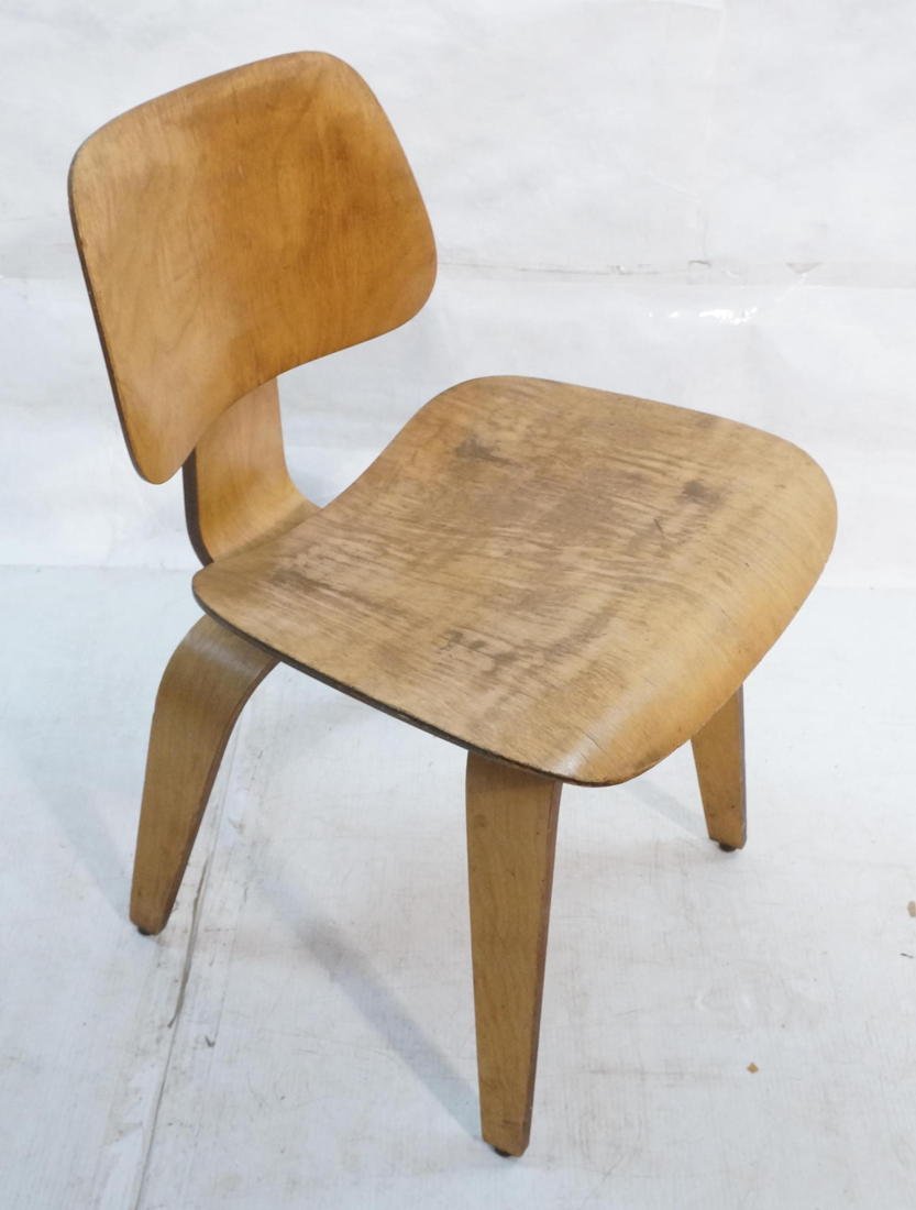 Early Charles EAMES LCW LOUNGE CHAIR.: Early Charles EAMES LCW LOUNGE CHAIR. Evans Products Label-- Dimensions: H: 29.5 inches: W: 19 inches: D: 21 inches ---