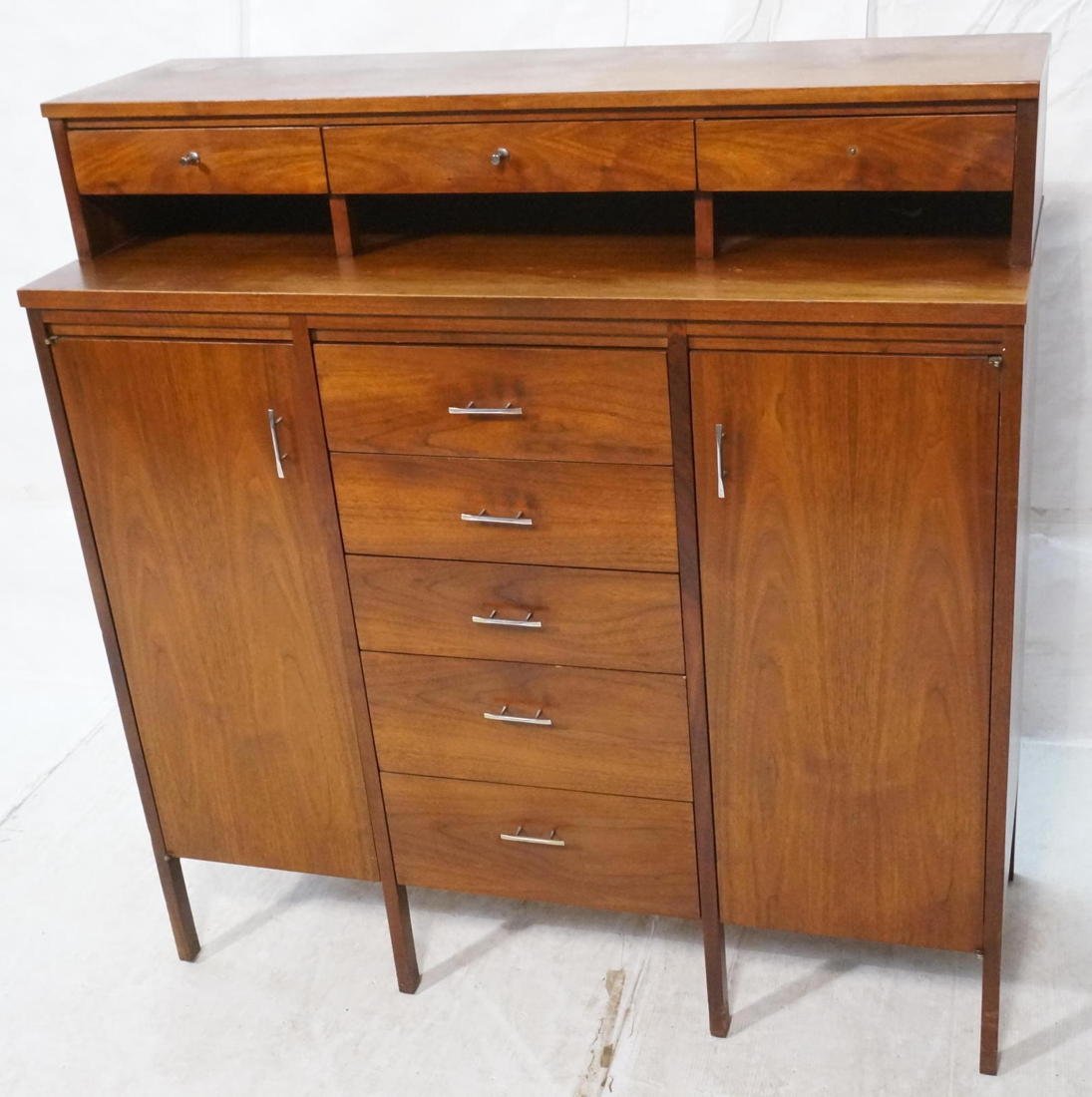 PAUL McCOBB for LANE Walnut Tall Dresser High Che: PAUL McCOBB for LANE Walnut Tall Dresser High Chest. Chromed metal pulls on eight drawers & two doors. Marked-- Dimensions: H: 50 inches: W: 48 inches: D: 18 inches ---