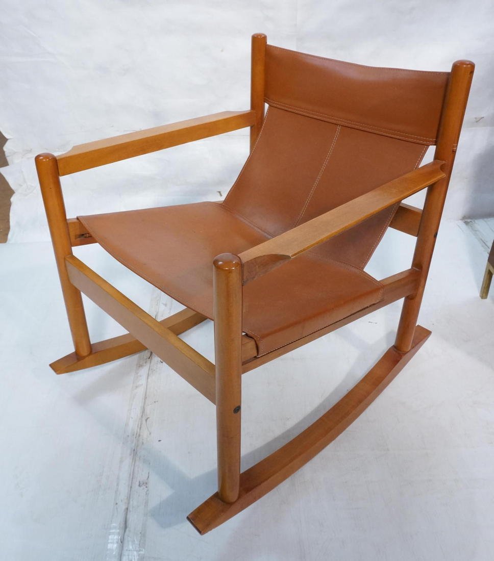 Scandinavian Tan Leather and Wood Rocking Chair.: Scandinavian Tan Leather and Wood Rocking Chair. Sling form seat. -- Dimensions: H: 33 inches: W: 26.25 inches: D: 32 inches ---