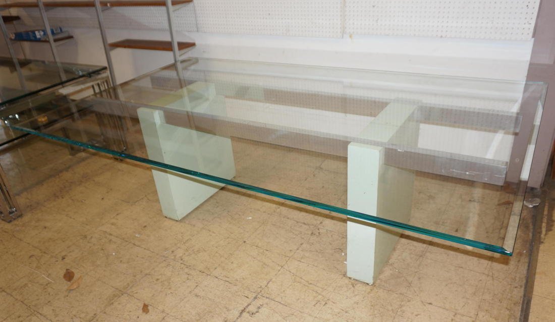 Vladimir KAGAN Glass Top Dining Table. Two painte: Vladimir KAGAN Glass Top Dining Table. Two painted wood slab bases with horizontal parallel bar construction. Floating glass top.-- Dimensions: H: 29 inches: W: 94.5 inches: D: 57.5 inches ---