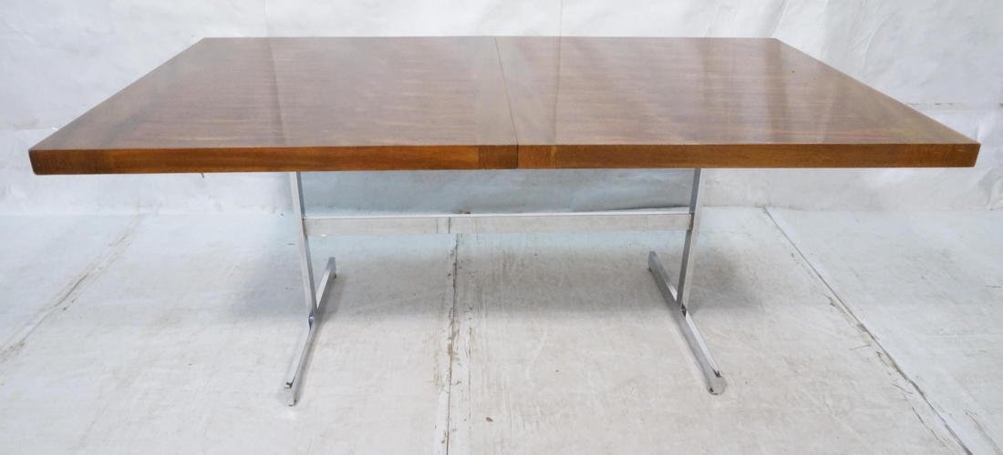 MILO BAUGHMAN Rosewood Dining Table. Thick rosewo: MILO BAUGHMAN Rosewood Dining Table. Thick rosewood top with contrast banded trim. Chromed steel inverted "T" base with stretcher. Two 18.5" leaves-- Dimensions: H: 29 inches: W: 72 inches: D: 42 inch