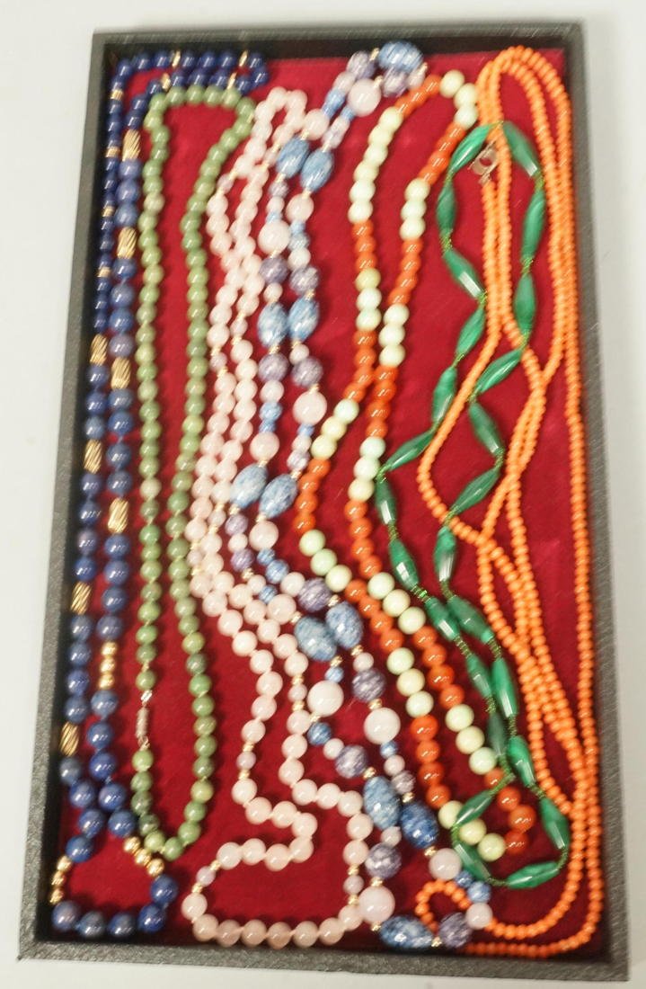 7pc Beaded Gemstone Necklaces. 1) Small coral bea: 7pc Beaded Gemstone Necklaces. 1) Small coral beads 58" necklace. 2) Malachite graduated barrel bead necklace. 27.5" 3) Rose quartz and gold bead hand knotted necklace. 4) Rose quartz and colored bead