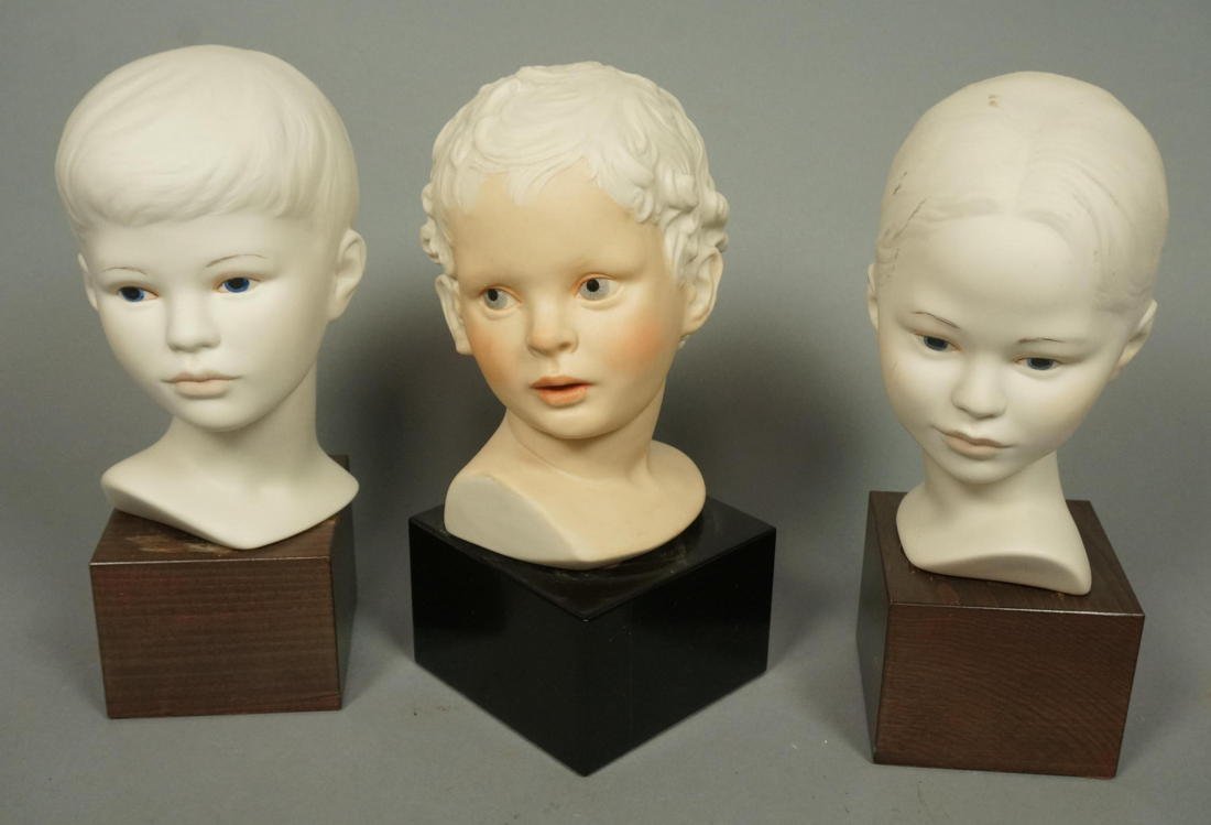 Three CYBIS Porcelain Bisque Heads. 1. Bisque Hea: Three CYBIS Porcelain Bisque Heads. 1. Bisque HeadBoy. 2. Bisque Head Girl with hair pulled back. 3. Curly haired child. All signed.-- Dimensions: H: 9.75 inches: W: 5.5 inches: D: 4 inches --- US Shi