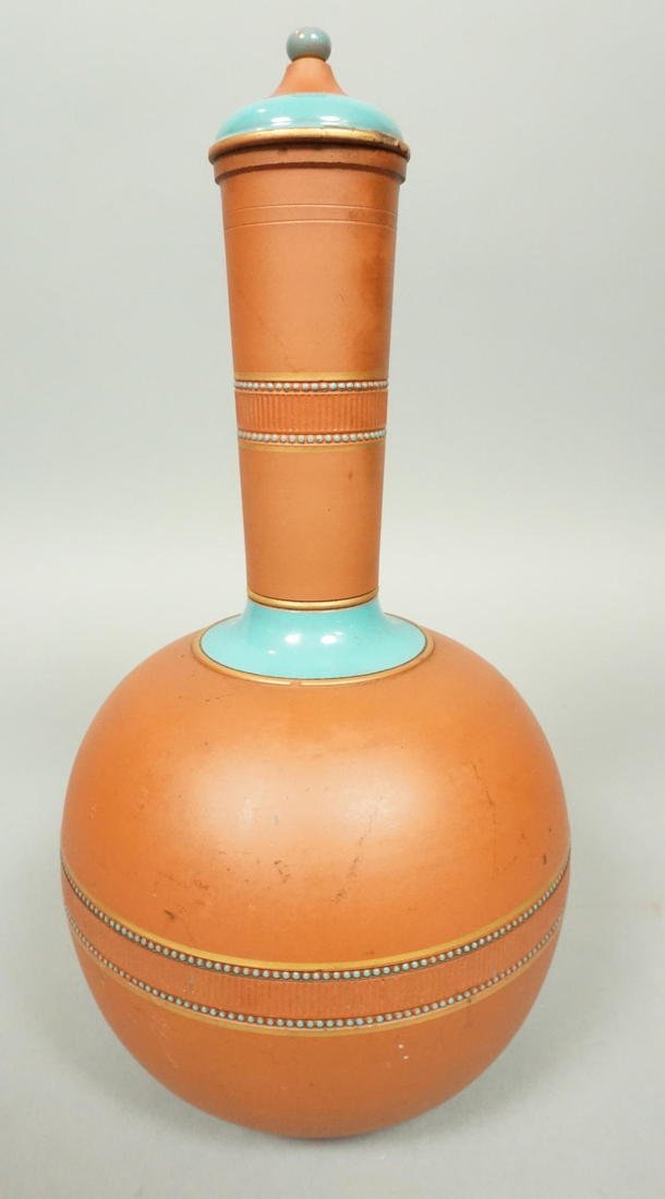 CHRISTOPHER DRESSER for Watcombe Decanter. Torqua: CHRISTOPHER DRESSER for Watcombe Decanter. Torquay England Stoppered Decanter. Terracotta Pottery. Marked Watcombe Torquay. -- Dimensions: H: 12 inches: W: 6 inches: D: 6 inches --- US Shipping charge