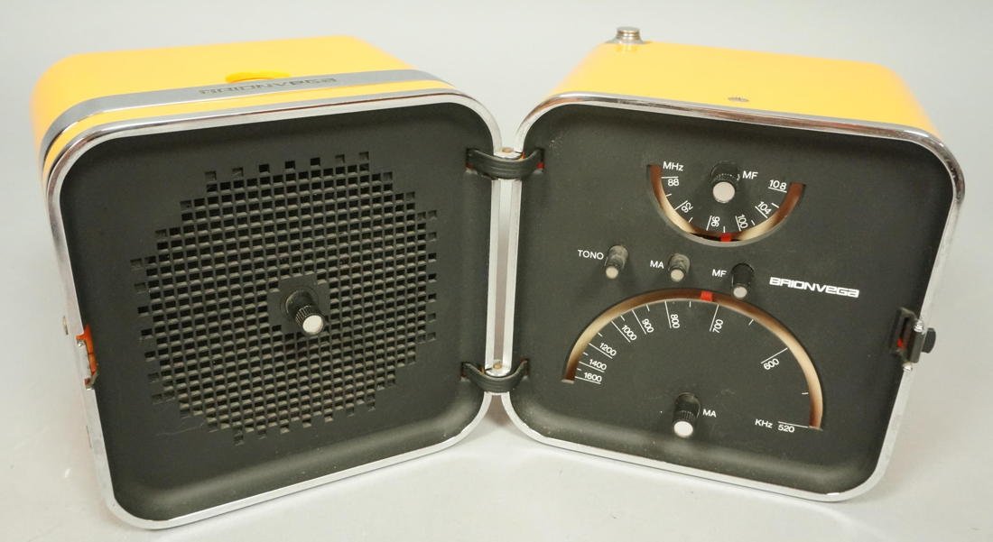BRION VEGA Folding Radio. Taxi Cab Yellow Plastic: BRION VEGA Folding Radio. Taxi Cab Yellow Plastic Case. Cube form. AM/FM Radio. Chrome trim.-- Dimensions: H: 5.25 inches: W: 9 inches: D: 5.25 inches --- US Shipping charge: $20