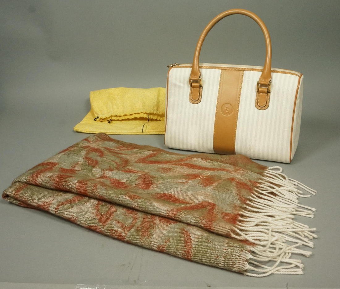 2pc FENDI Fashion Accessory Lot. 1. FENDI Handbag: 2pc FENDI Fashion Accessory Lot. 1. FENDI Handbag Purse. Tan leather trim. With felt bag. 2. Fringed Wool Italian Scarf in leaf design.-- Dimensions: H: 7.5 inches: W: 12 inches: D: 6 inches: L: inche