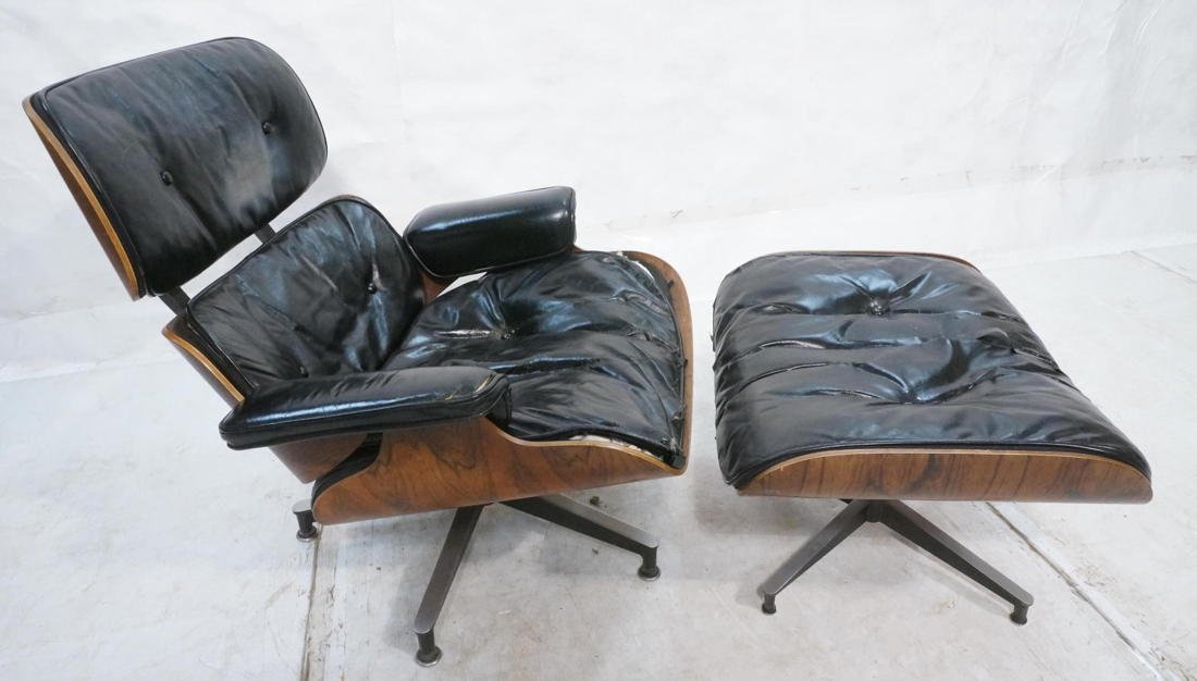 CHARLES EAMES Rosewood Lounge Chair Ottoman. Blac: CHARLES EAMES Rosewood Lounge Chair Ottoman. Black Leather. Early model with down cushions #670. Herman Miller. Marked. -- Dimensions: H: 33 inches: W: 33 inches: D: 31 inches ---