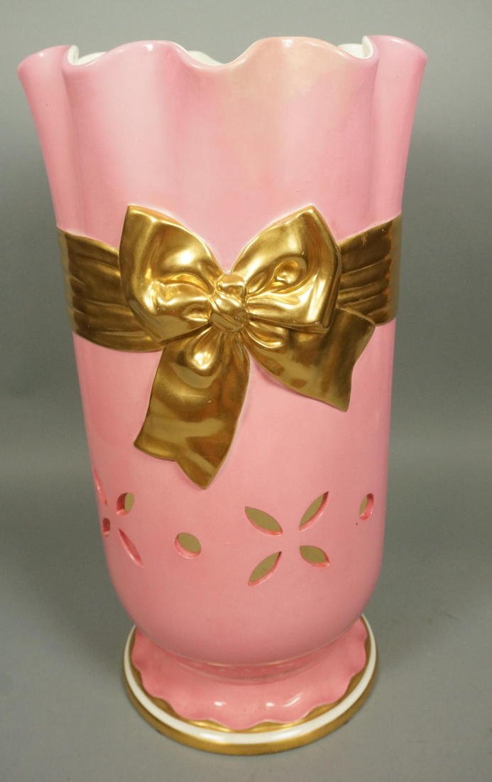 Heavy Ceramic Pink with Gold Ribbon Bow Umbrella: Heavy Ceramic Pink with Gold Ribbon Bow Umbrella Stand. Pierced details-- Dimensions: H: 22 inches: W: 12 inches: D: 12 inches ---