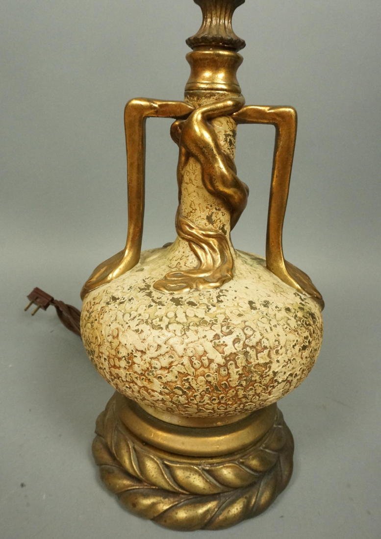 Bronze Overlay Lamp. Textured body with gilt hand: Bronze Overlay Lamp. Textured body with gilt handles. Designed by Olive Kooken. -- Dimensions: H: 26 inches: W: 8.5 inches ---