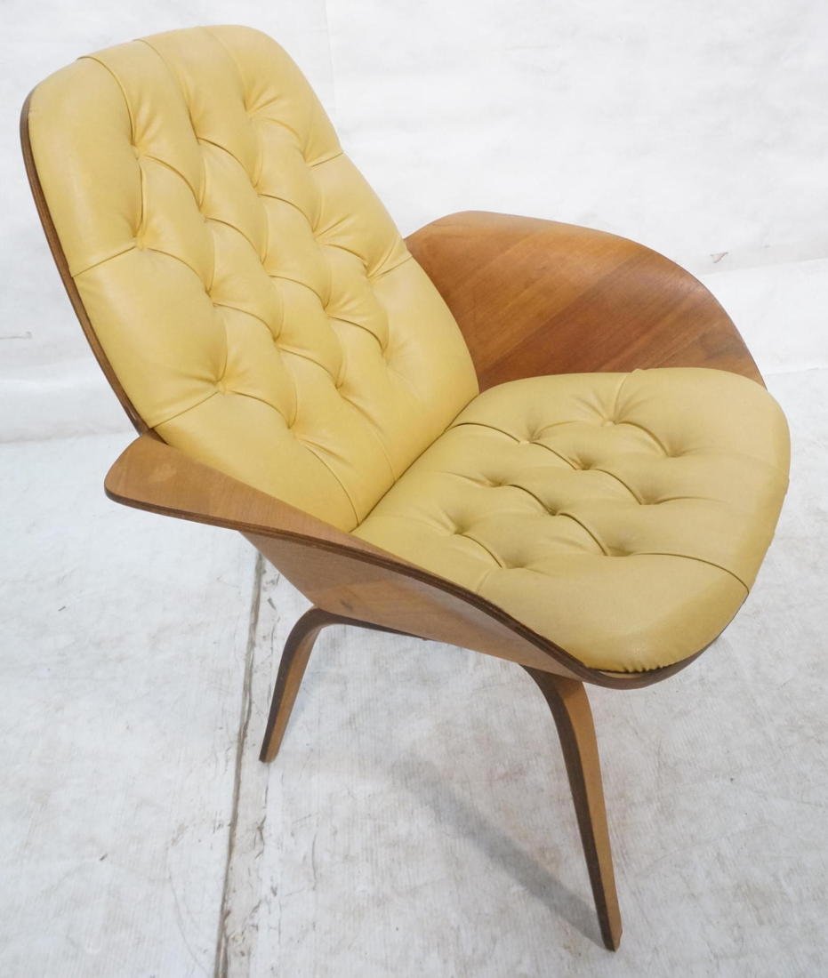 PLYCRAFT Molded Plywood Arm Lounge Chair. Moderni: PLYCRAFT Molded Plywood Arm Lounge Chair. Modernist wood frame with wing arms. Gold tufted vinyl upholstery. Marked-- Dimensions: H: 32 inches: W: 29 inches: D: 23 inches ---