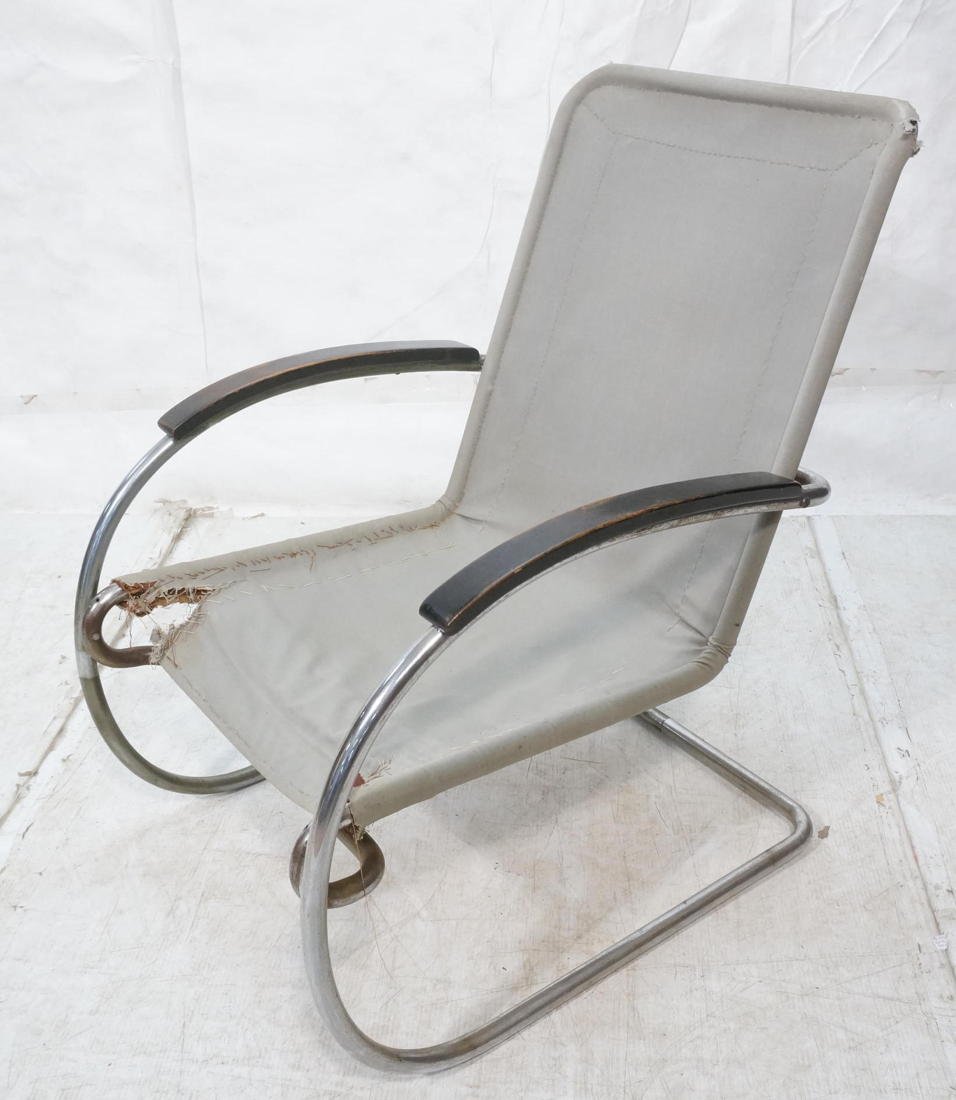 Early THONET Tubular Metal Arm Chair Modernist. A: Early THONET Tubular Metal Arm Chair Modernist. ANTON LORENZ. c 1925. Chrome Frame Lounge Chair. Black Wood Handles. Canvas Sling Seat. -- Dimensions: H: 36 inches: W: 25 inches: D: 31 inches ---