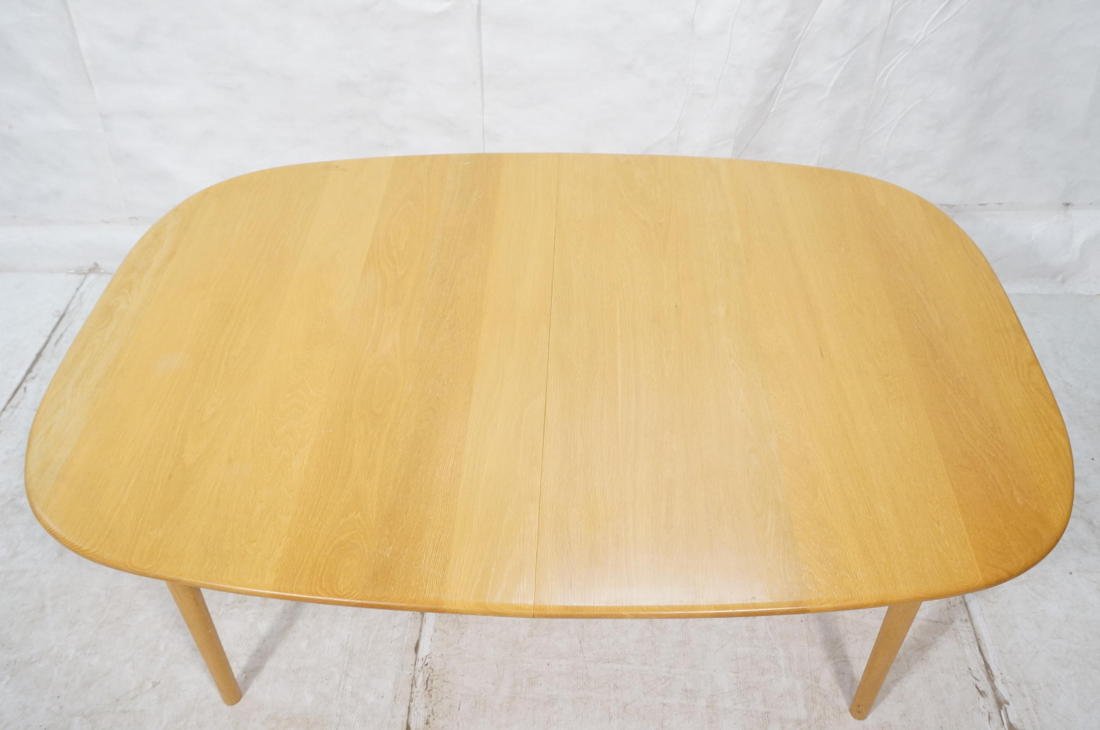 Vintage Modern Dining Table. Bowed Sides. CHARLES: Vintage Modern Dining Table. Bowed Sides. CHARLES WEBB Custom designed by American Studio Woodworker. Solid wood top on tapered legs. (2) 14" leaves can be stored under table. Label.-- Dimensions: H:
