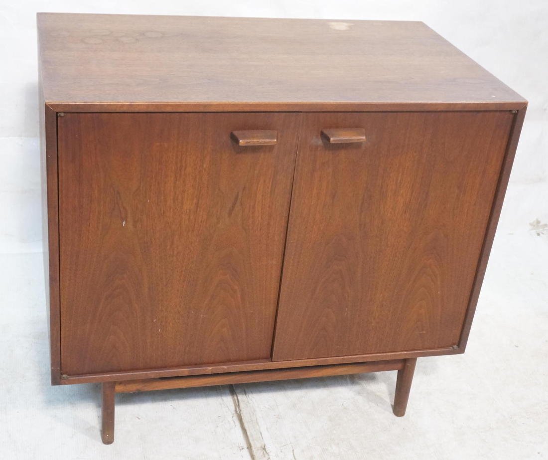 JENS RISOM Two Door Cabinet. Tapered legs and woo: JENS RISOM Two Door Cabinet. Tapered legs and wood handles. -- Dimensions: H: 32 inches: W: 36 inches: D: 21 inches ---